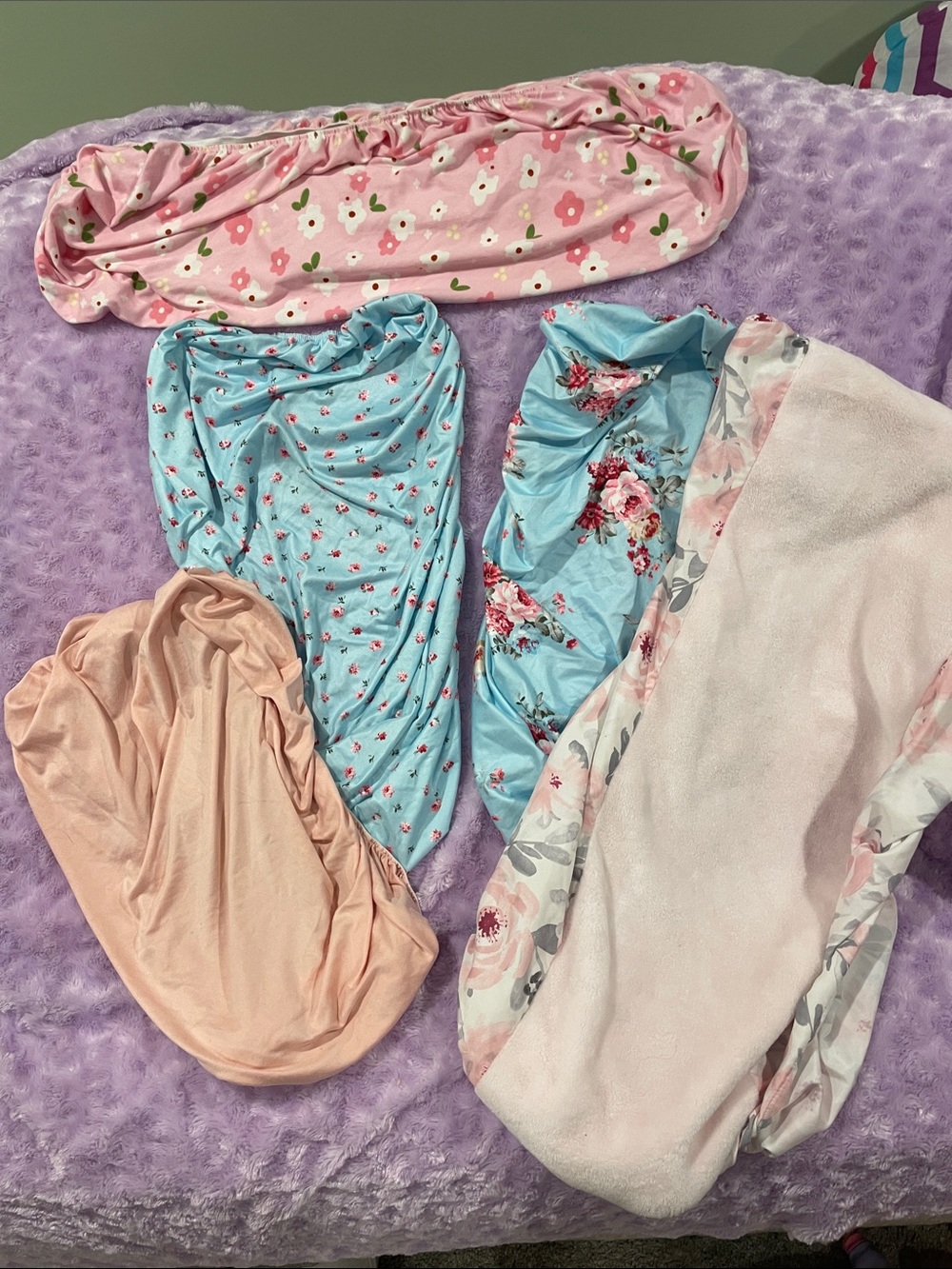 Fitting changing table sheets